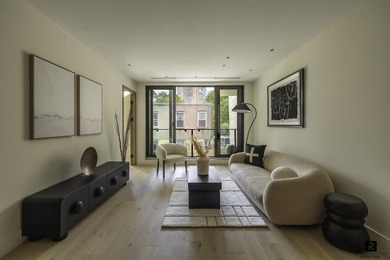 The rare one-bedroom with a true dressing room. Residence 2B is - photo 2
