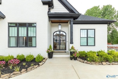 This beautifully designed 4-bedroom home features an open floor - photo 4