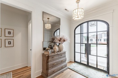 This beautifully designed 4-bedroom home features an open floor - photo 5