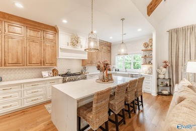 This beautifully designed 4-bedroom home features an open floor - photo 9