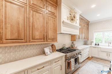 This beautifully designed 4-bedroom home features an open floor - photo 10