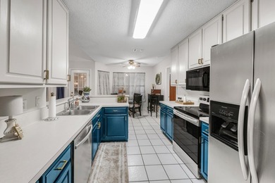 This beautifully maintained 3-bedroom, 2-bath home offers the - photo 12