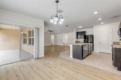 Tucked inside a welcoming gated community, this charming home - photo 11