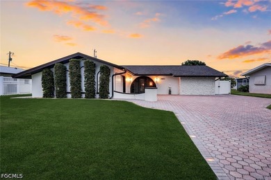Welcome to this charming and beautifully updated Cape Coral home - photo 1