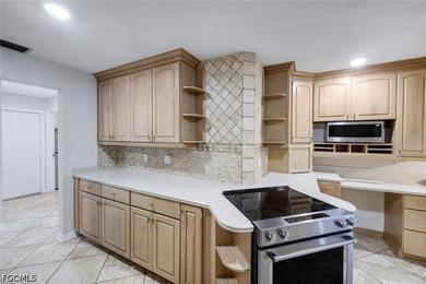 Welcome to this charming and beautifully updated Cape Coral home - photo 6