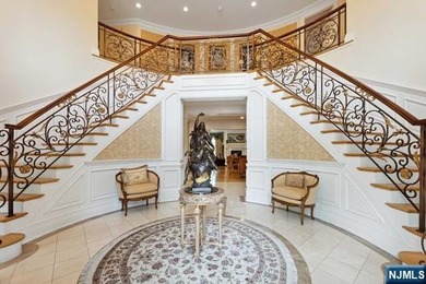 MAJESTICALLY SET ON 2 MANICURED ACRES, THIS BRICK COLONIAL MANOR - photo 5