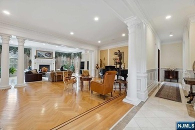 MAJESTICALLY SET ON 2 MANICURED ACRES, THIS BRICK COLONIAL MANOR - photo 8