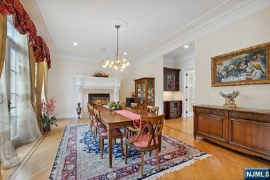 MAJESTICALLY SET ON 2 MANICURED ACRES, THIS BRICK COLONIAL MANOR - photo 9