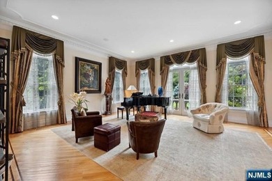 MAJESTICALLY SET ON 2 MANICURED ACRES, THIS BRICK COLONIAL MANOR - photo 10