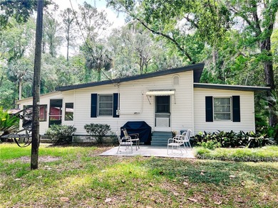 Charming cracker style home, guest cottage and barn are located - photo 3