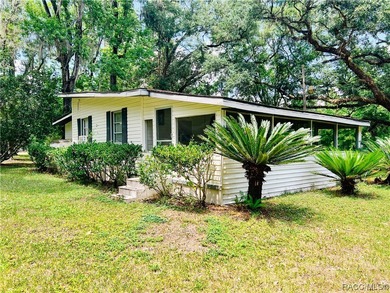 Charming cracker style home, guest cottage and barn are located - photo 5