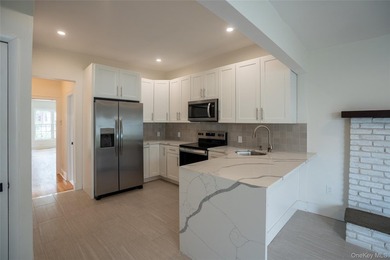 Adorable renovated Colonial in the highly desirable West Hills - photo 8