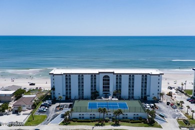 Experience breathtaking direct oceanfront living in this
