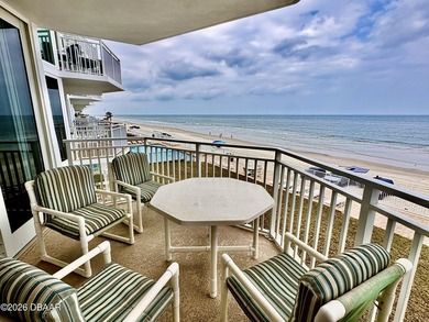 Experience breathtaking direct oceanfront living in this
