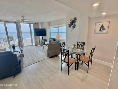 Experience breathtaking direct oceanfront living in this