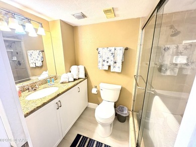 Experience breathtaking direct oceanfront living in this