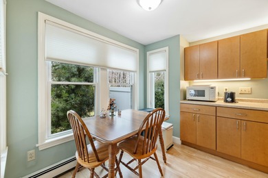 Experience the tranquility of an end-unit condominium, where - photo 8