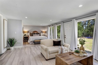 Step into this exquisitely renovated 1925 residence, where - photo 7