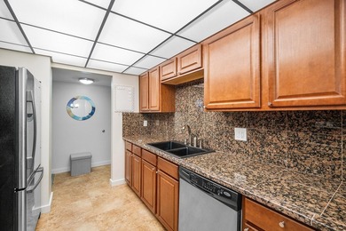 Light and bright south-facing condo just steps to the beach and - photo 12