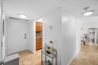 Light and bright south-facing condo just steps to the beach and - photo 15