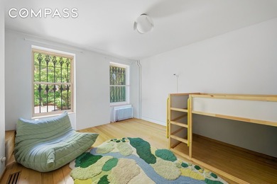 304 Clinton Avenue is a rare wide four-family townhouse located - photo 17