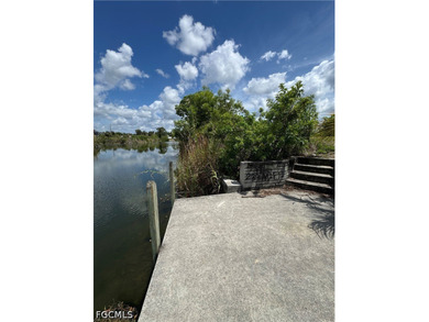 Sunset exposure lot on wide canal with seawall and dock already - photo 3