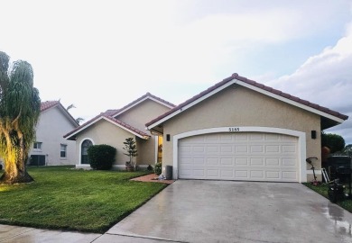 Lake Home For Sale in Boynton Beach, Florida