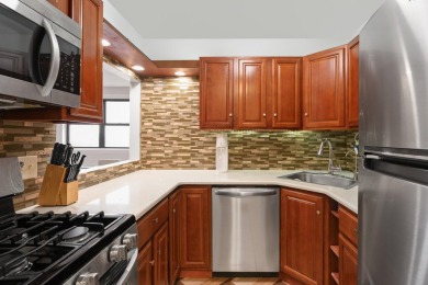 Enjoy easy living in this well-maintained 9th-floor condo at