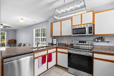 Rare opportunity to own a first-floor end-unit condo in a prime - photo 13