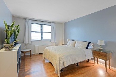 Enjoy easy living in this well-maintained 9th-floor condo at