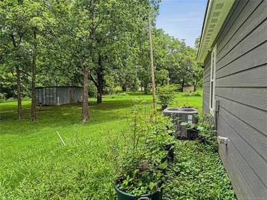 This delightful 3-bedroom, 2-bathroom home is nestled in a quiet - photo 3
