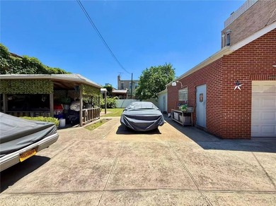 Stunning detached two-family home situated in the highly - photo 12