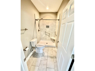 The spacious, open floor plan includes hardwood flooring, gas - photo 20