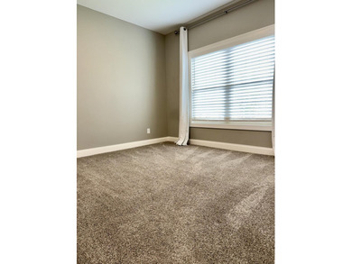 The spacious, open floor plan includes hardwood flooring, gas - photo 23