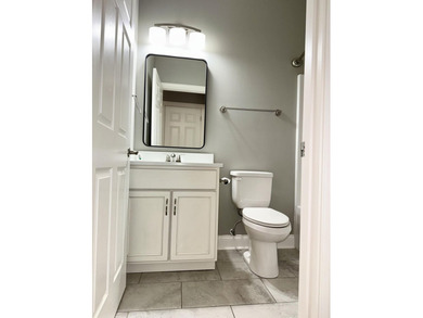 The spacious, open floor plan includes hardwood flooring, gas - photo 25