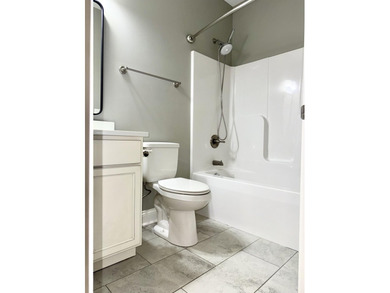 The spacious, open floor plan includes hardwood flooring, gas - photo 26