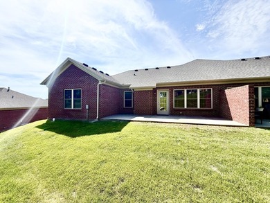 The spacious, open floor plan includes hardwood flooring, gas - photo 32