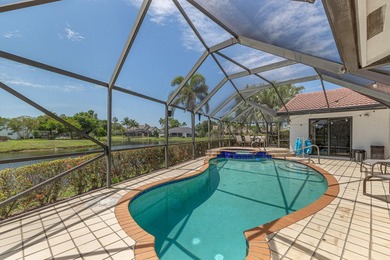PRICE IMPROVEMENT! 4 BEDROOM + DEN HEATED POOL HOME ON A - photo 1