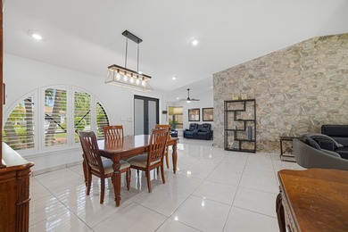 PRICE IMPROVEMENT! 4 BEDROOM + DEN HEATED POOL HOME ON A - photo 3