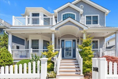 Welcome to this beautiful beachside Colonial located in the - photo 1