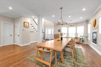Welcome to this beautiful beachside Colonial located in the - photo 3