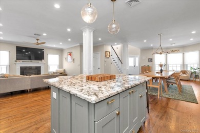 Welcome to this beautiful beachside Colonial located in the - photo 9