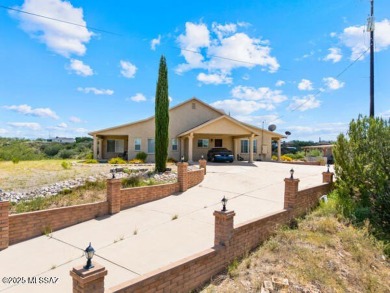 ''Nestled on a hilltop in Central Rio Rico, this charming home