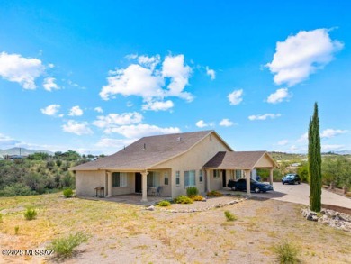 ''Nestled on a hilltop in Central Rio Rico, this charming home