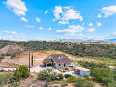 ''Nestled on a hilltop in Central Rio Rico, this charming home