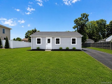 LIVING LUXURY In The Heart Of Bellport! This Ranch Style Home Is - photo 1