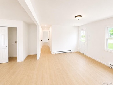 LIVING LUXURY In The Heart Of Bellport! This Ranch Style Home Is - photo 4