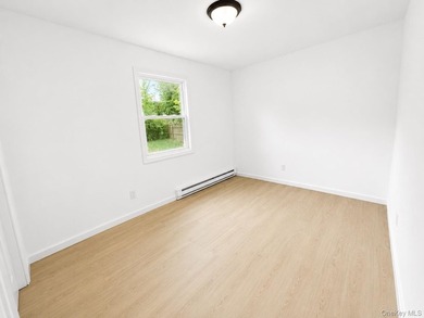 LIVING LUXURY In The Heart Of Bellport! This Ranch Style Home Is - photo 10