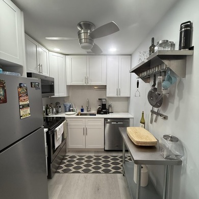 Come and see this beautiful remodeled 2 bedroom, 1 bath condo - photo 8