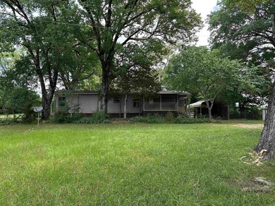 Cute little two bedroom mobile home sitting on .76 acres in - photo 1